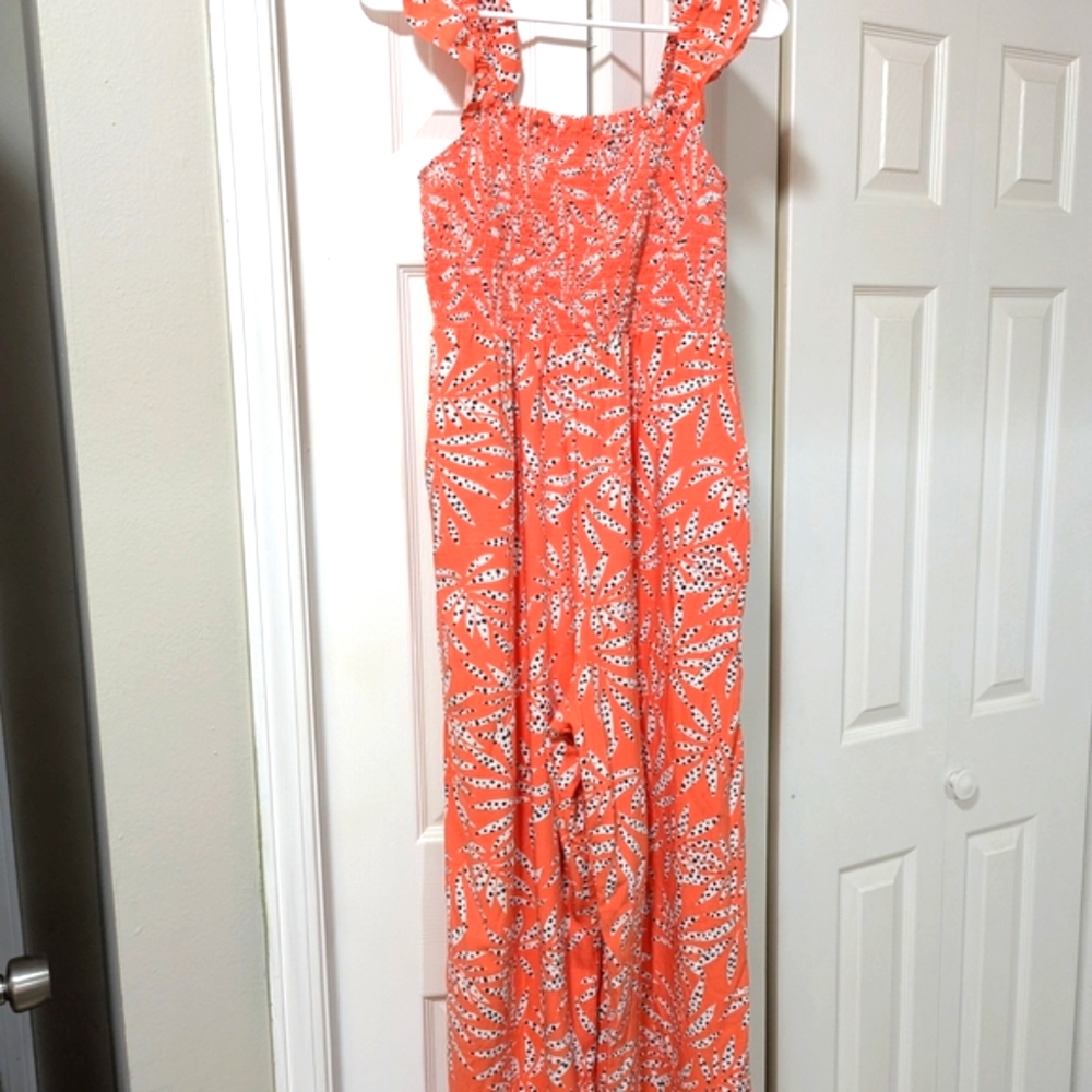 Vibrant Loft Orange Maxi Jumpsuit with White Floral Design